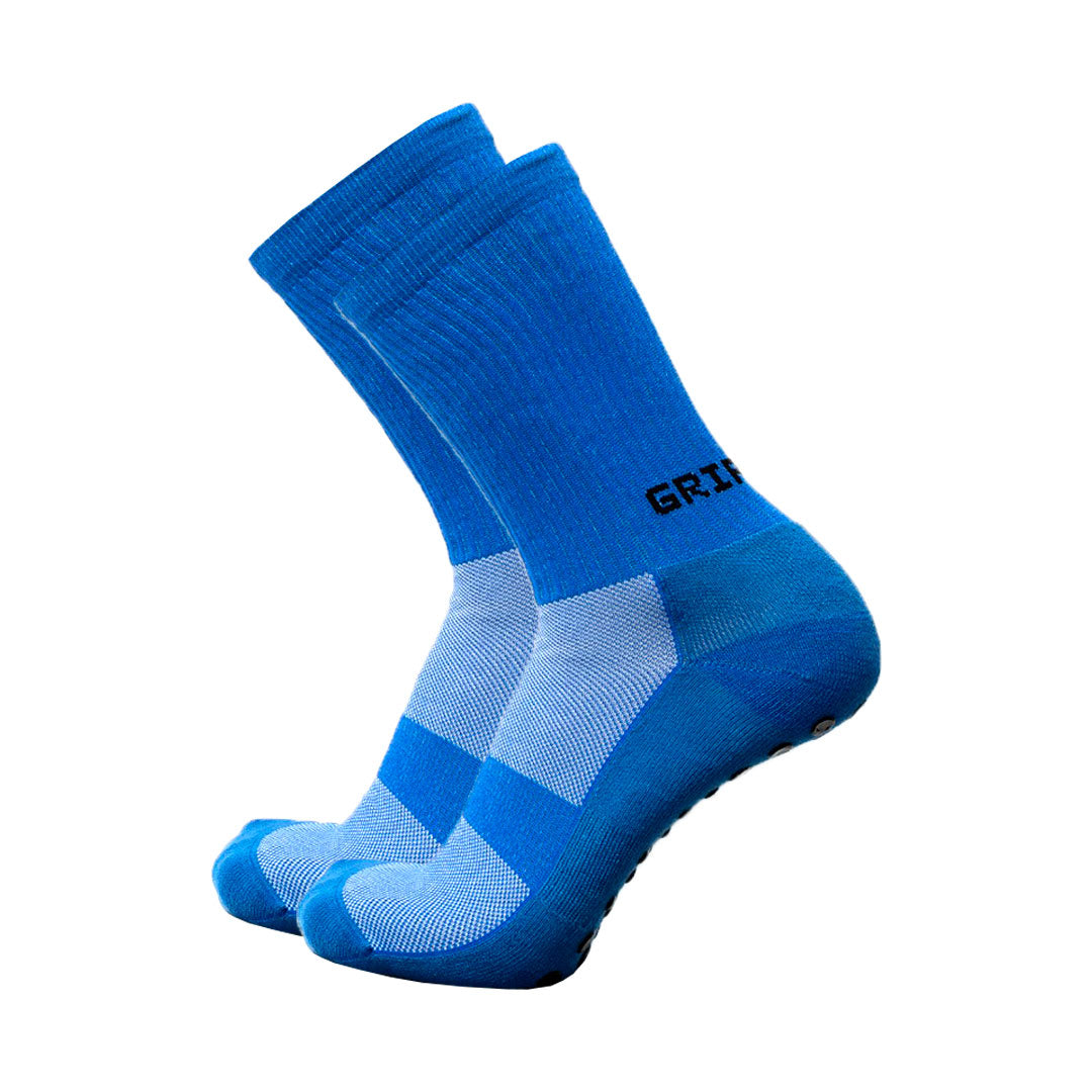 Meias com antiderrapante (grip), na cor azul, para desporto como o futebol.