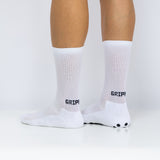 Meias com antiderrapante (grip), na cor branca, para desporto como o futebol ou futsal..