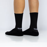 Meias com antiderrapante (grip), na cor preto, para desporto como o futebol ou futsal..