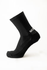 Meias com antiderrapante (grip), na cor preta, para desporto como o futebol ou futsal..