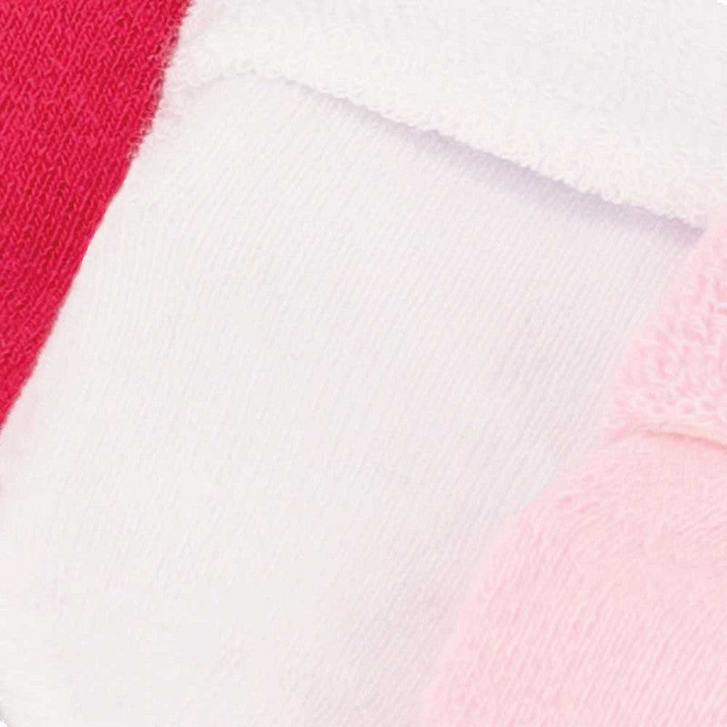 Pack de 4 meias de bebé em algodão, antiderrapantes e sem costuras, com punho dobrável unicolor. Conforto e segurança máxima para o uso diário e pés sempre quentinhos.