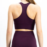 Top de desporto, na cor bordô, para mulher. Top com bom suporte no peito.Perfeito para atividades de alto desempenho.
