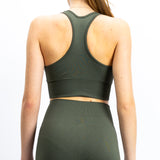 Top de desporto, na cor verde, para mulher. Top com bom suporte no peito.Perfeito para atividades de alto desempenho.
